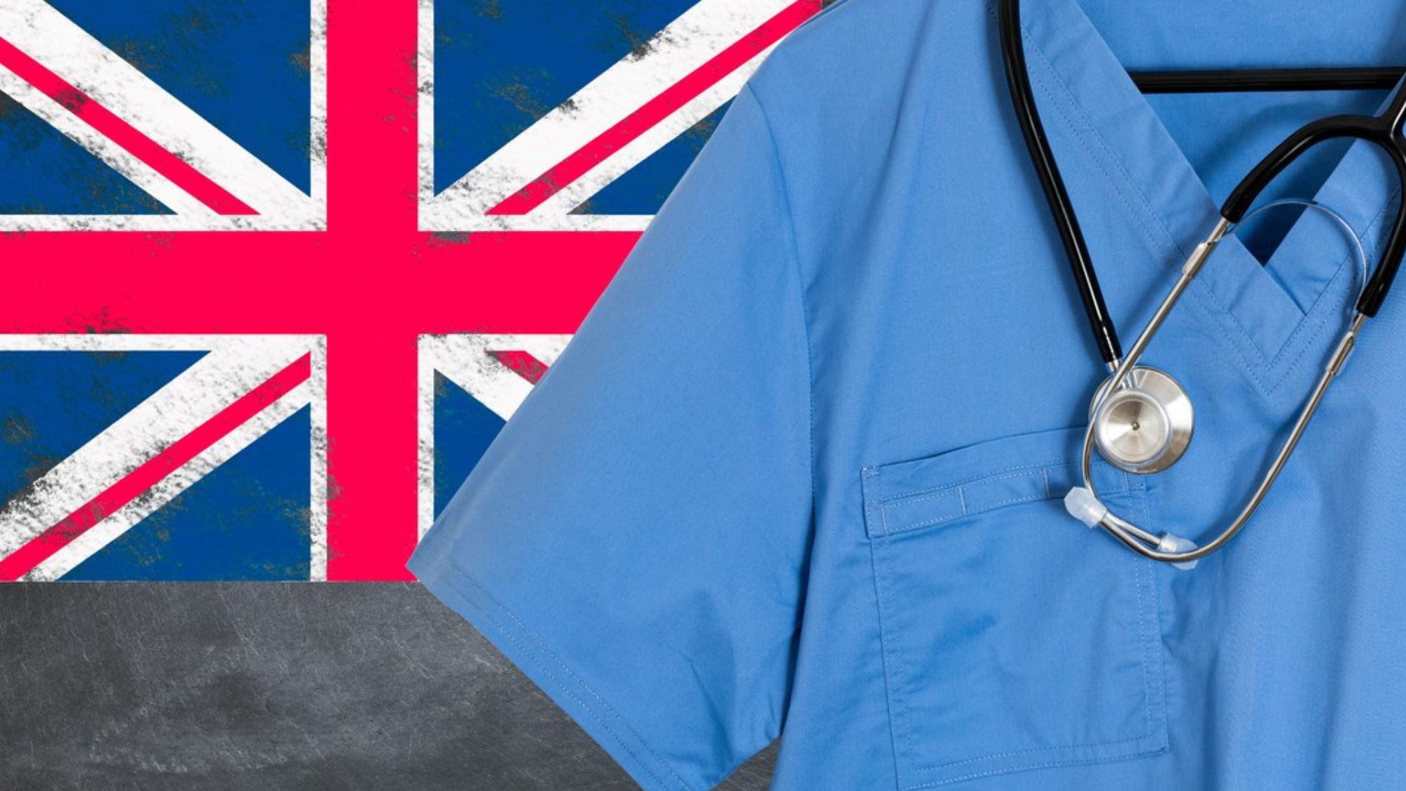 A pair of medical scrubs and a UK flag