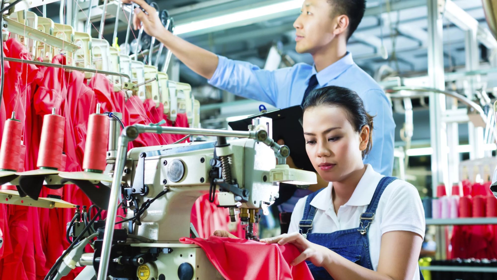 Employees implementing smart technologies & textile industry standards to enhance production